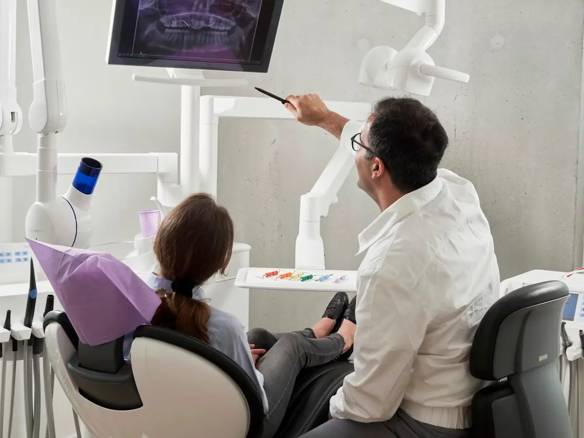Patient smiling during an orthodontic consultation